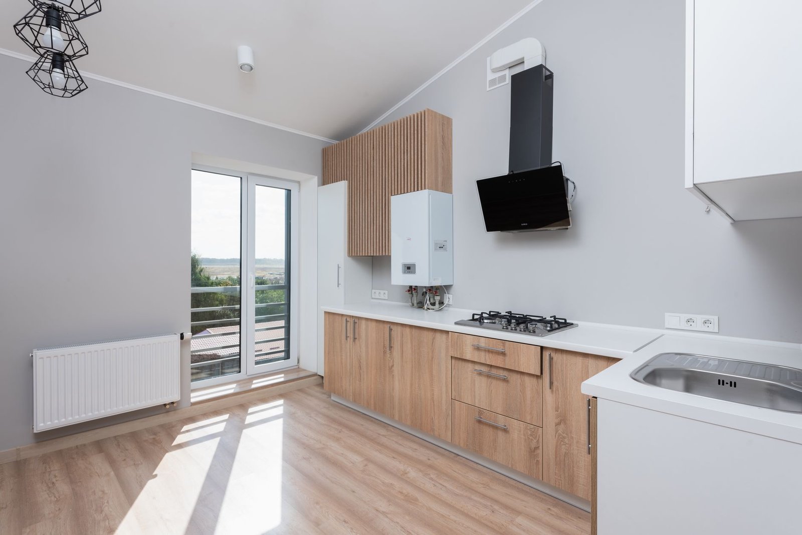 Bright, modern kitchen with large windows