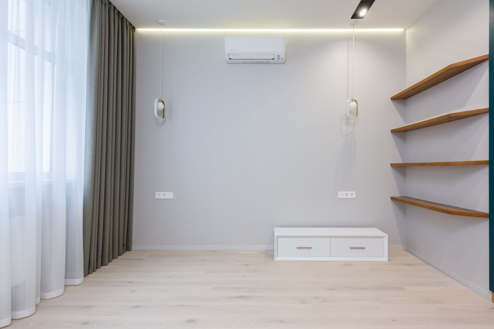 Wall-mounted ductless mini-split unit in a modern interior